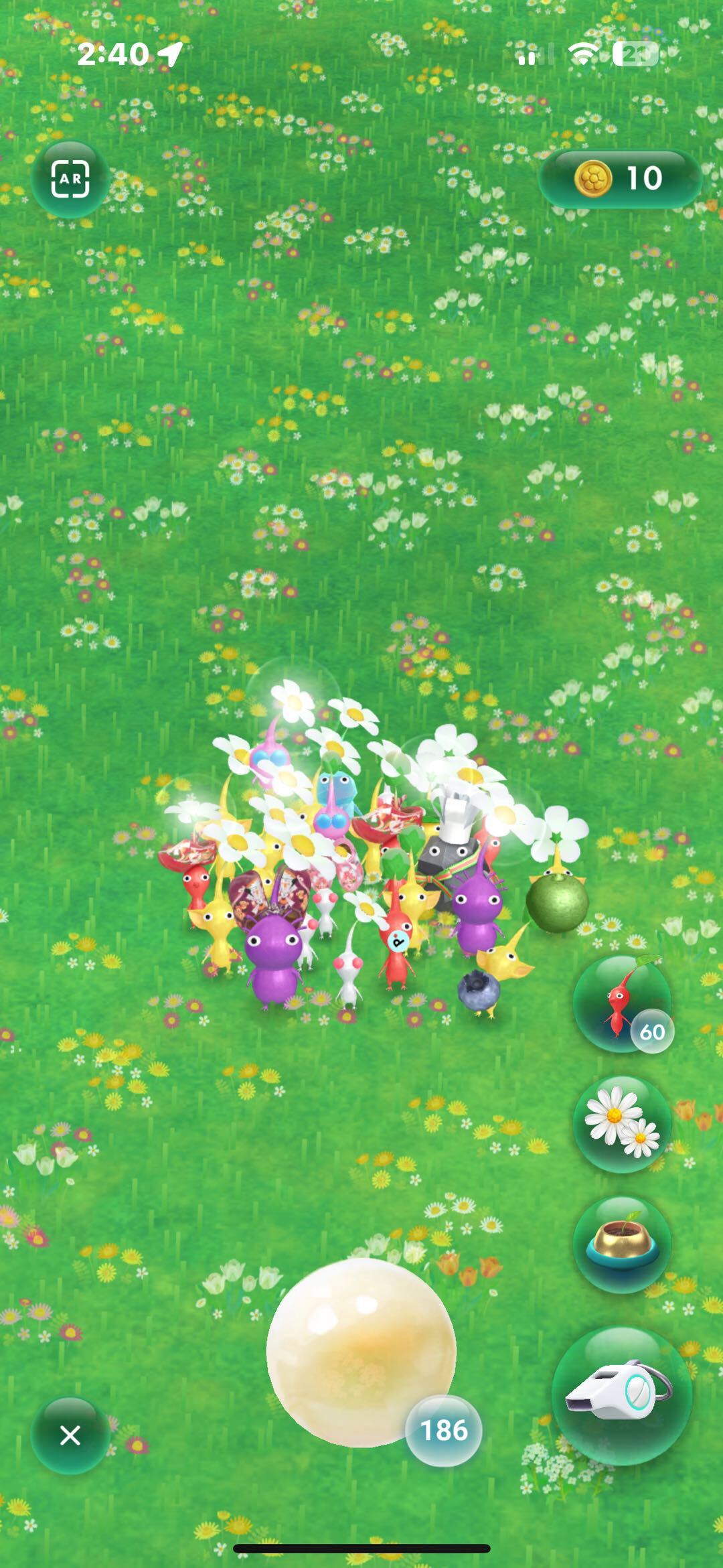 Pikmin Bloom 餵食精華畫面，皮克敏頭上花朵發光